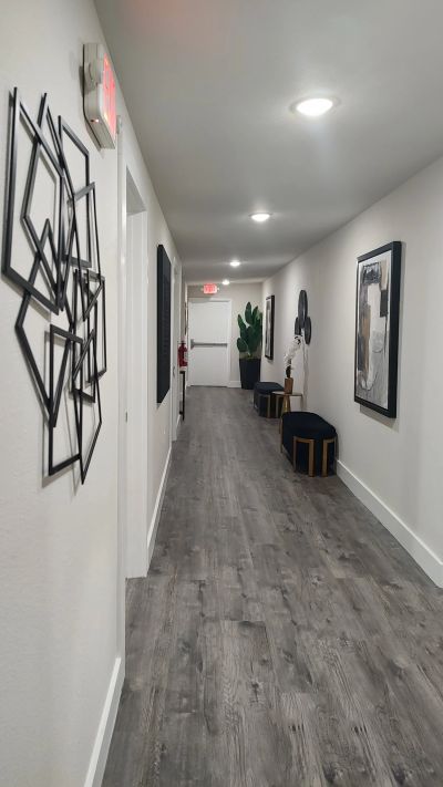 Hallway with geometric diamond artwork