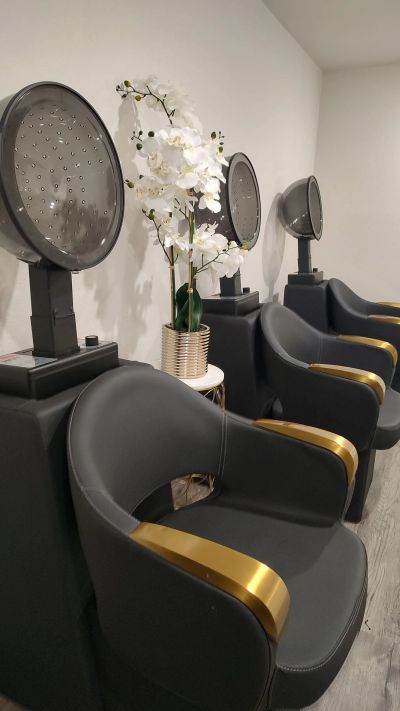 Hair dryer chairs with gold-accent styling